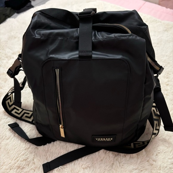 Versace Parfums | black and gold backpack tote bag